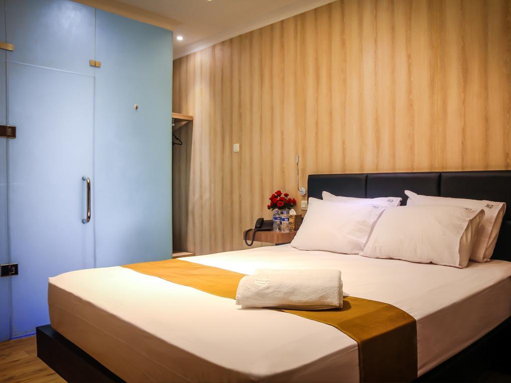 Madu Inn Jakarta Room photo